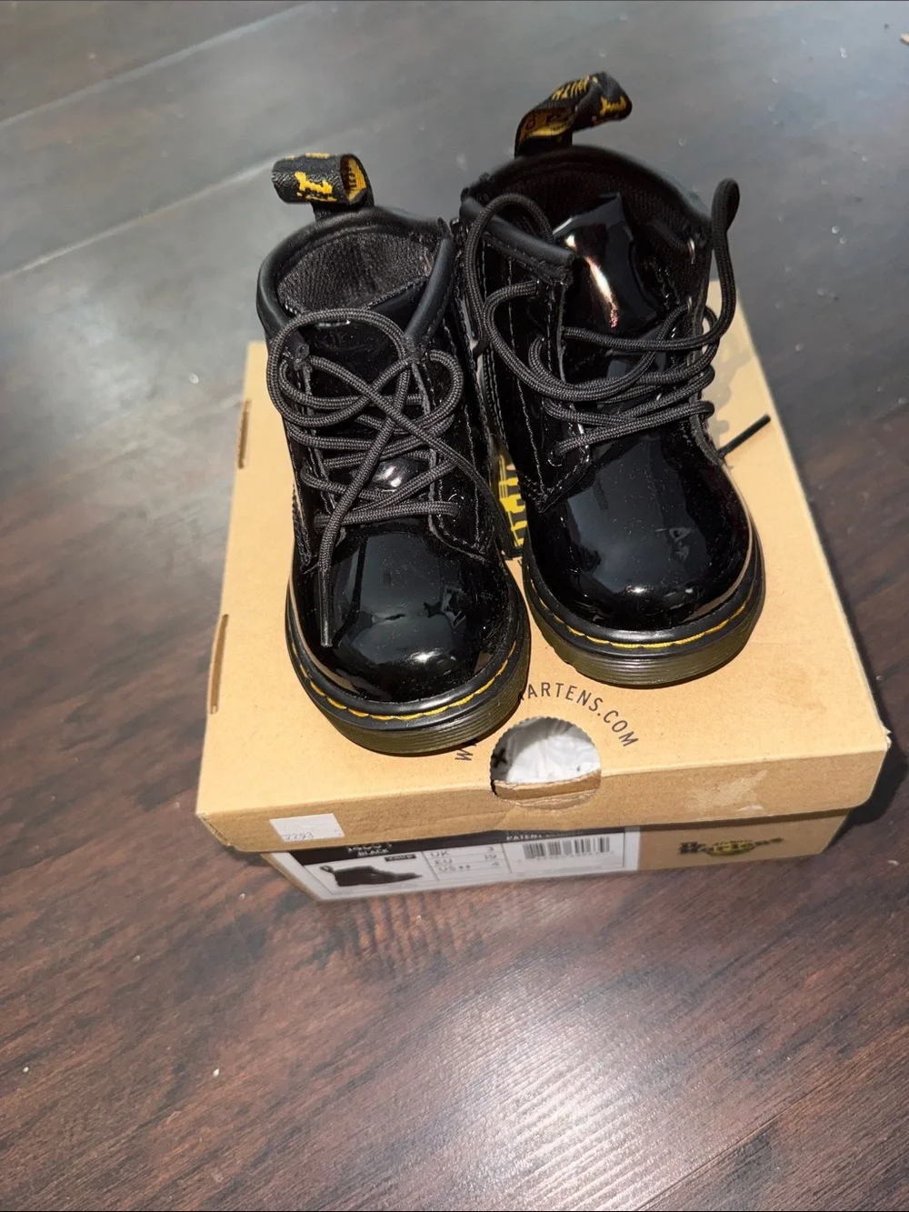 Dr. Martens Kids Black Patent Lace-Up Boots with Yellow Stitching